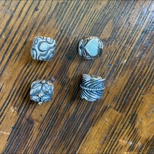 4 Pandora charms. Used. Sold as a group.